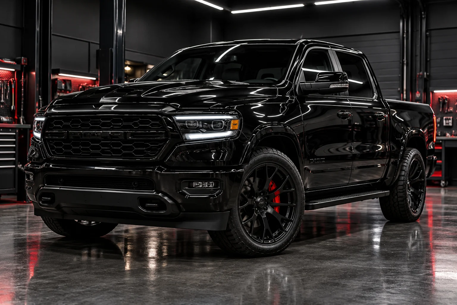 Customized black pickup truck with upgraded wheels in a dark automotive workshop